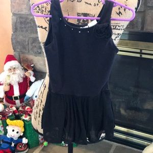 black leotard with attached skirt